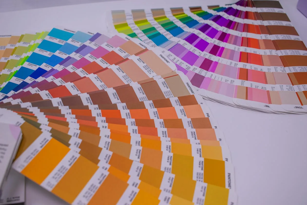 Collection of Pantone colour swatches used by designers for accurate brand colour matching and print production