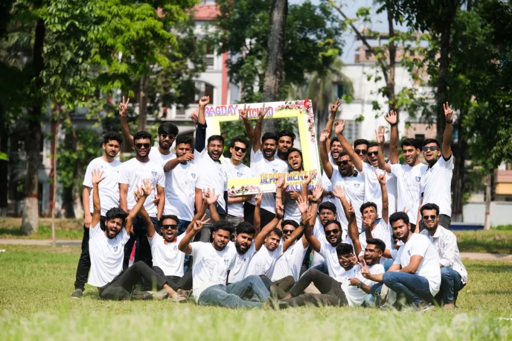 Large group in printed event T-shirts at a group event