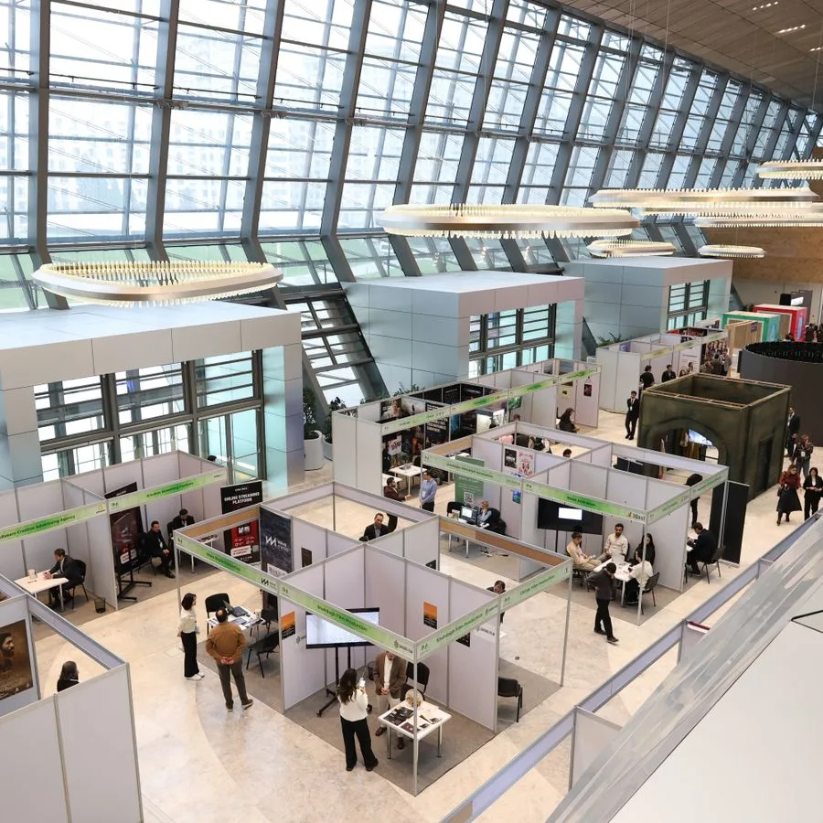 Exhibition stands and booths inside a modern trade show hall