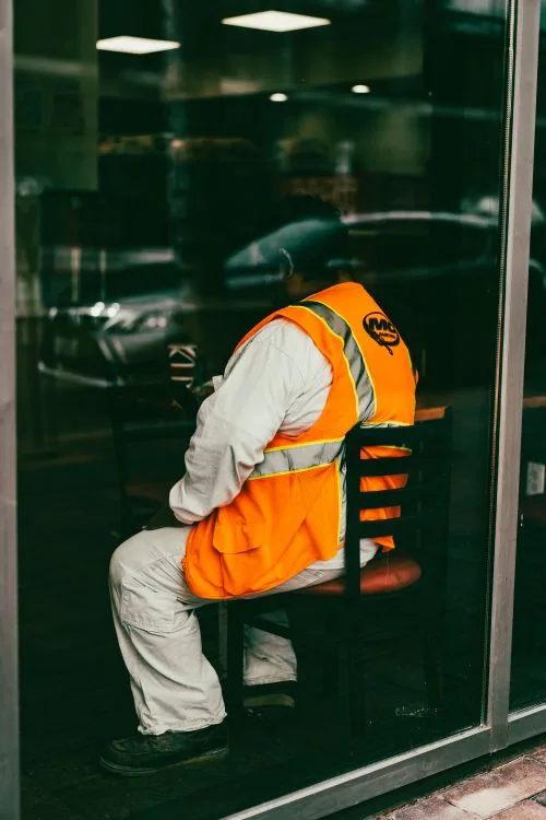 Hi-vis safety vest worn on a construction site