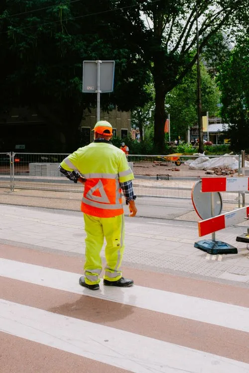 Branded hi-vis jacket at work site