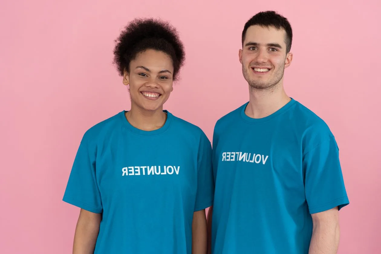 Volunteers wearing matching branded t-shirts at an event