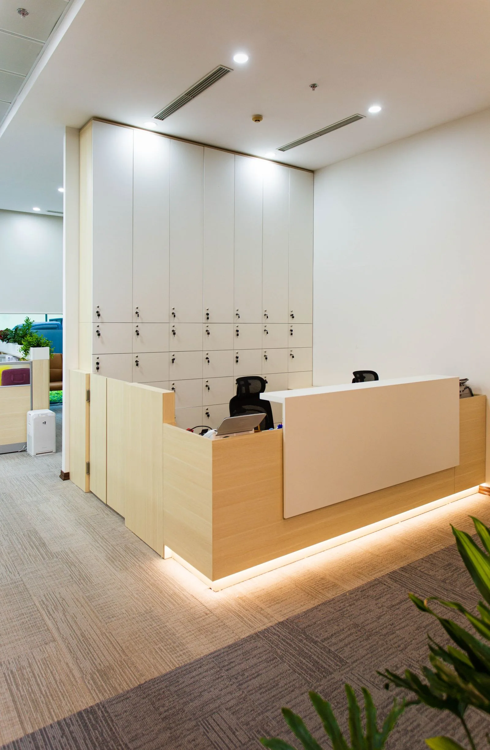 Modern minimalist reception desk with built-in lighting