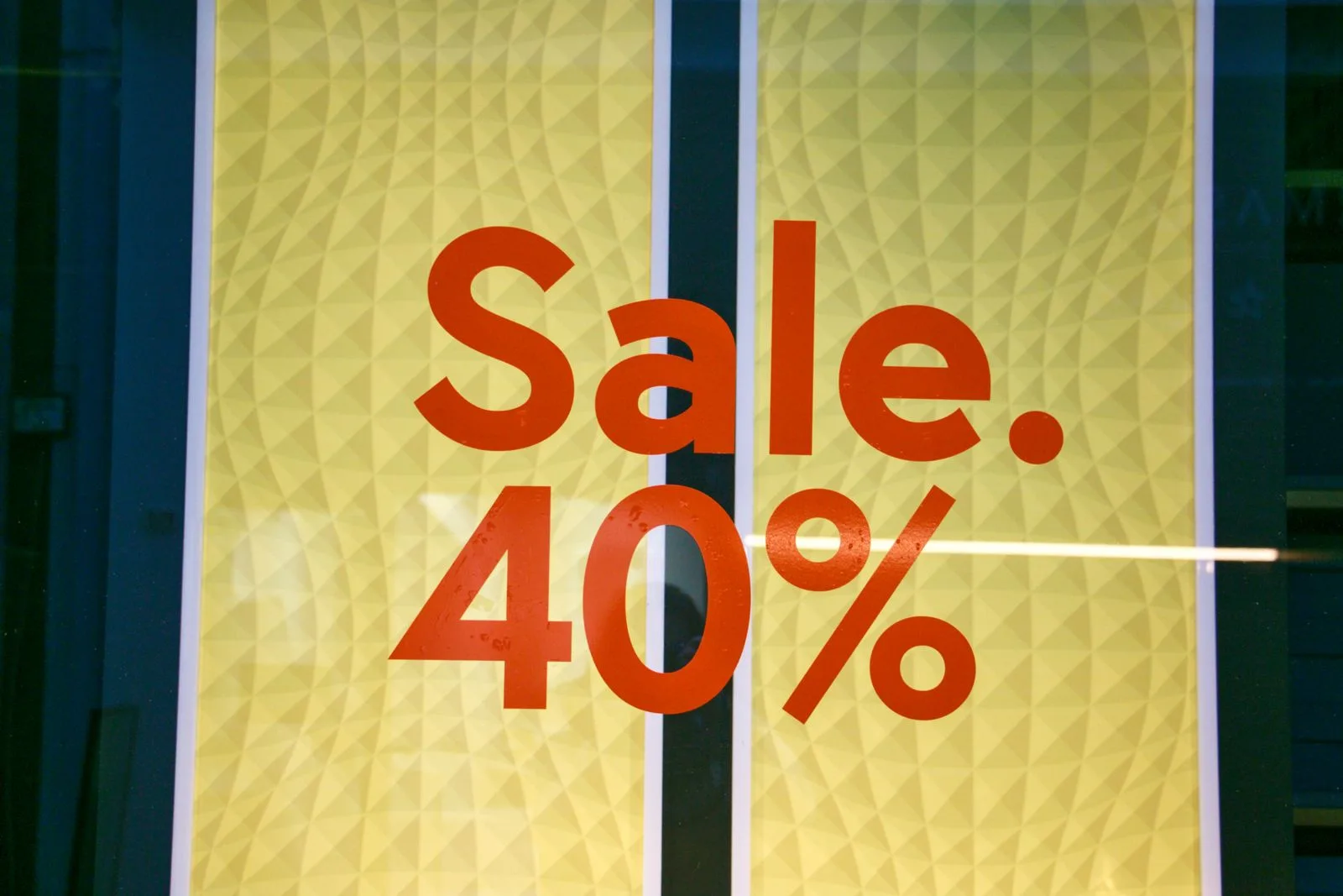 Bright 40 percent sale sign on a retail store window