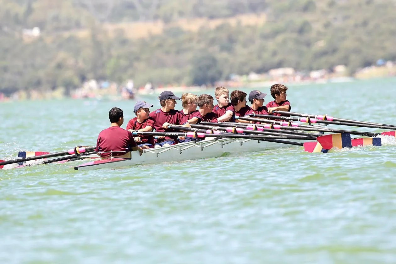 Youth rowing crew in action on the water